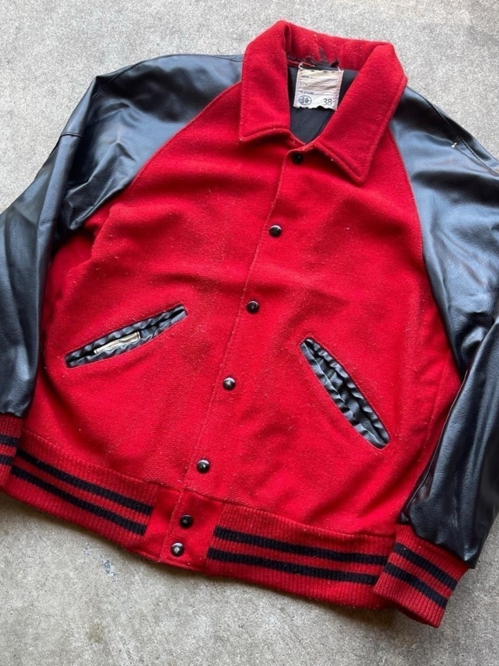 Vintage Wool Red  Letterman Jacket with black leather sleeves.